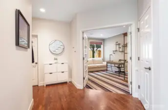 Double glass doors to the main level bedroom or work from home office with adjacent 3/4 bath.