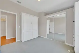 Second bedroom features a Murphy bed—great for guests or a home office!