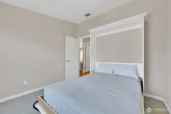 Second bedroom features a Murphy bed—great for guests or a home office!