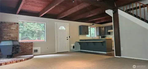 Notice the natural wood ceiling