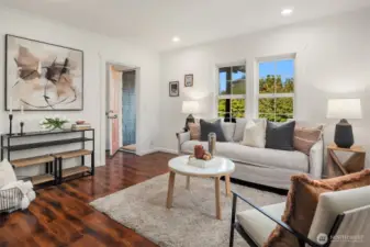 The living room is spacious and versatile with fantastic light. No carpet anywhere in the house.