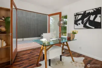 The second bedroom features french doors that go out to the back deck. There is another "man door" off the kitchen making 2 access points to the back.