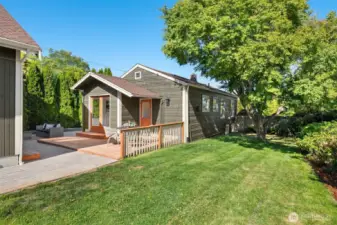 A sizable side yard on south side of the house provides a nice buffer and ample yard space.
