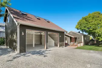 Oversized garage doors lead to an oversized and extra deep garage.