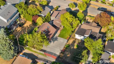Looking down from above gives you a good sense of how the property lays out. The red gates are off the alley in the lower center of the picture.