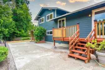 Off the dining room enter a spacious fully fenced backyard.