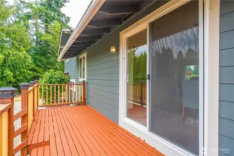 Large deck and patio for entertaining.