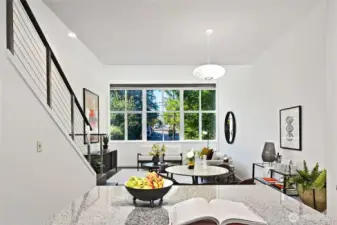 Expansive windows, framed by mature trees, invite serene green views while offering a sense of natural privacy.