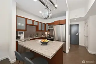 Great use of space in this kitchen, newer appliances, granite island, counter seating, under cabinet lighting and so much more.