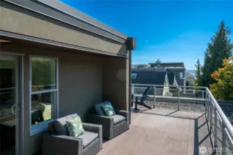 This home's view deck. Notice another sitting area and the very top of the Space Needle. A perfect spot to view the fireworks on New Year's Eve with friends and family.