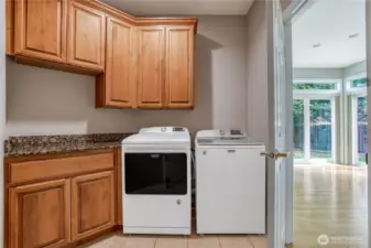 Laundry with included washer and dryer.