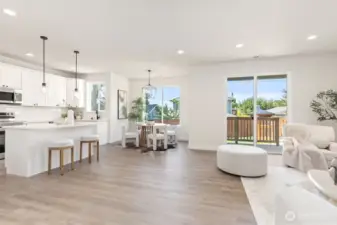 Interior photo shown is from a similar new construction home by the same builder. Fixtures, flooring, floor plan, and finishes are representative and may differ from the home currently under construction.