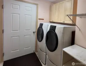 laundry/mud room with door into garage