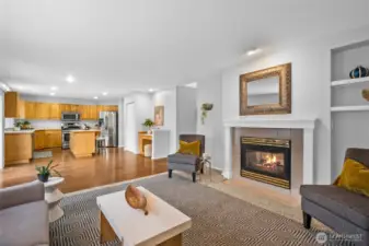 Family room off kitchen with see through fireplace
