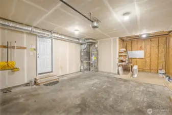 Workshop area in the backside of the garage is great for hobbies or storage.