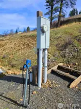 This is the power/water hookup for barn or garage/shop down below.