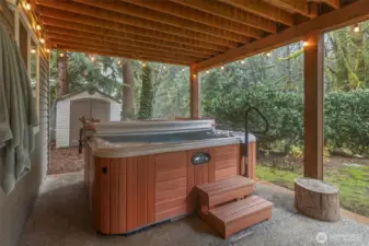 Enjoy the hot tub in the covered space off the bonus room.