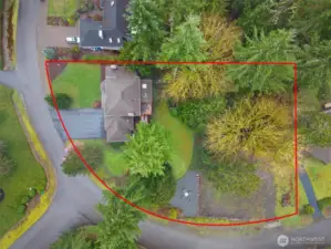 Parcel includes large unfinished field area next to the fire pit.