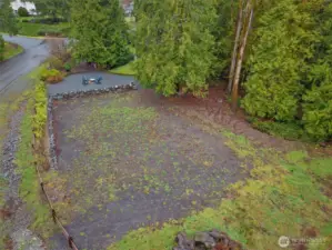 This space has so many possibilities! Potential sport court, shop, or garden.