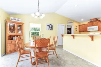 Large dining room just off kitchen