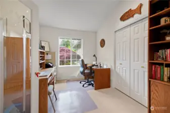 Office/den with French doors and a storage closet.