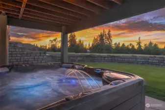 On the lower patio, just outside the recreation room, the hot tub provides the ultimate relaxation. Luxuriate with a backdrop of nature's beauty.