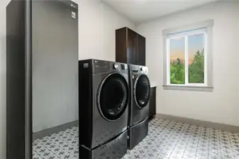 Second Story Utility Room with LG Appliances to Convey