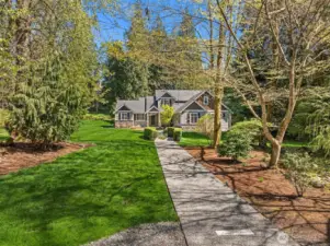 Storybook setting on shy 2 acre corner lot