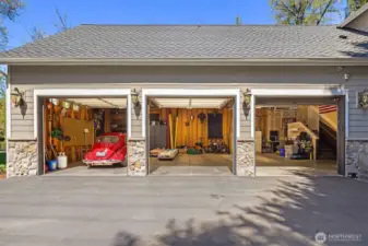 Tremendous space in this 3 car garage with large full length storage overhead