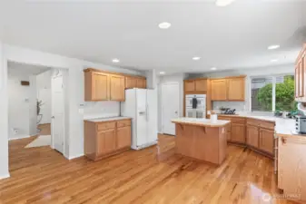 View of kitchen into the entry on left