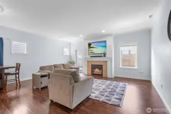 Two tone paint with crown molding. Ceiling medallions around the light fixtures.