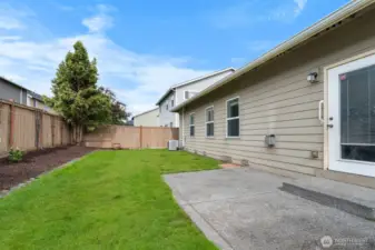 Enjoy grilling on the patio in summertime. Door opens from Living room.