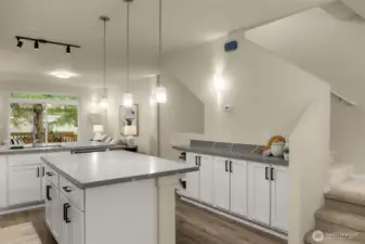 newly updated kitchen w/ SS appliances, 5 burner gas range, new carpeting, refinished cabinets & new countertops