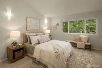 primary suite, boasting vaulted ceiling, his/her closets& a perfectly manicured en-suite bath.