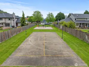 Community park, sport courts, swings, soccer field.