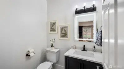 This convenient half bathroom downstairs is perfect for everyday use and guests
