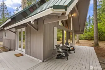 Wrap-around front porch connecting the front and side of the house.