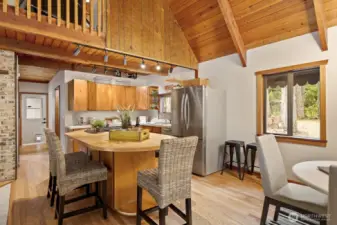 Well-designed kitchen with both dining space and a functional eat-in island.