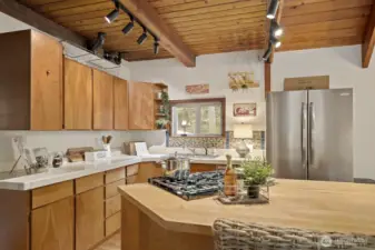 Well-appointed kitchen with plentiful storage and a generous center island for cooking and entertaining.