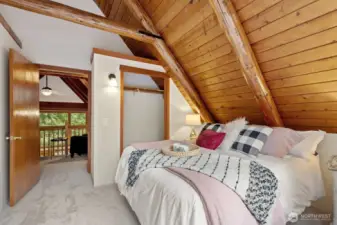 Freshly carpeted bedroom with convenient closet storage.