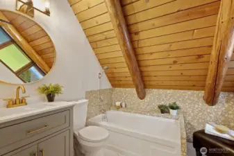 Updated upstairs full bath--new flooring, hardware, mirror, fixtures & vanity.