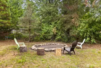 Expansive outdoor and hobby spaces with greenhouse and elk-proof garden area.