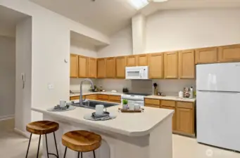 Kitchen features a classic working triangle for ease of cooking.