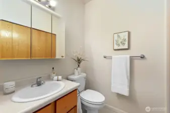 Half bathroom is convenient for guests.