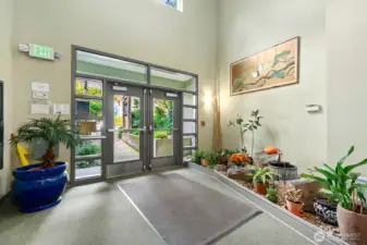 The Midori Condos lobby is welcoming and peaceful.  It has a trickling water feature.