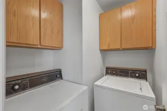 Laundry room with washer and dryer included