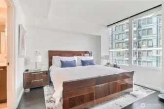 Spacious King-Size Primary Suite with Automatic Blinds