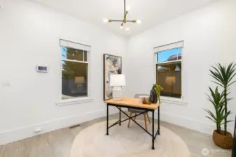 Enjoy this bonus flex space right around the corner from the kitchen.  Perfect office, den or workout room