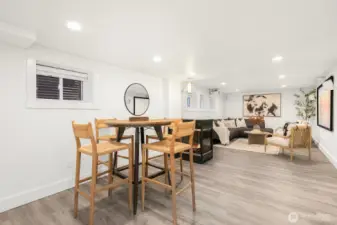 Lower level offers an enormous family room complete with a cozy fireplace and projector!