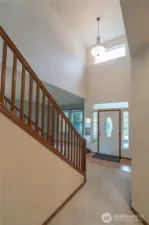 Hallway to Kitchen, Utility, Half Bath, Office/4th Bedroom, Garage